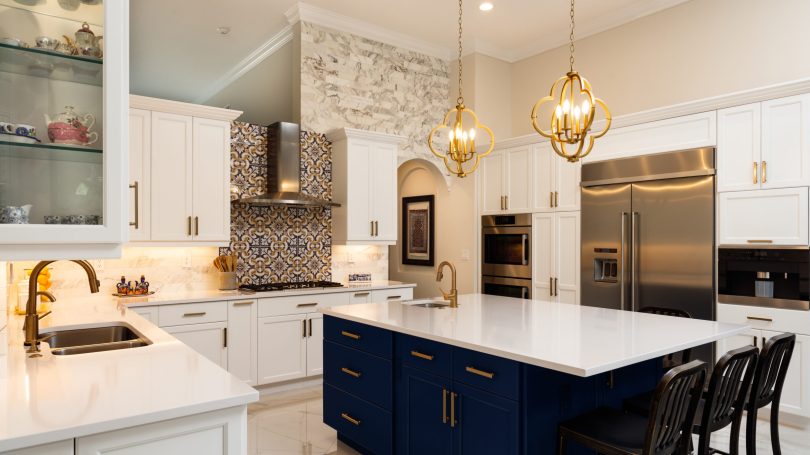 Beautiful luxury home kitchen with white cabinets.